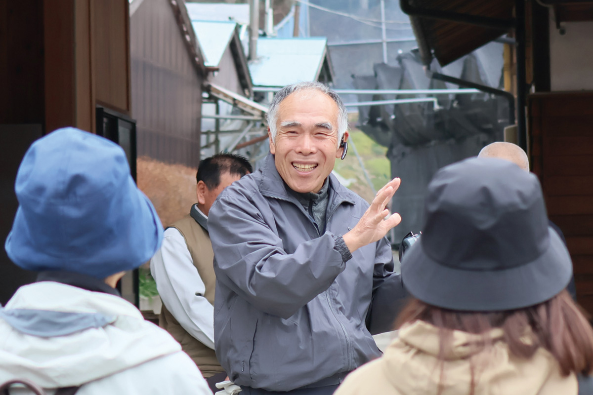 組合員交流会で案内をする芳賀さん