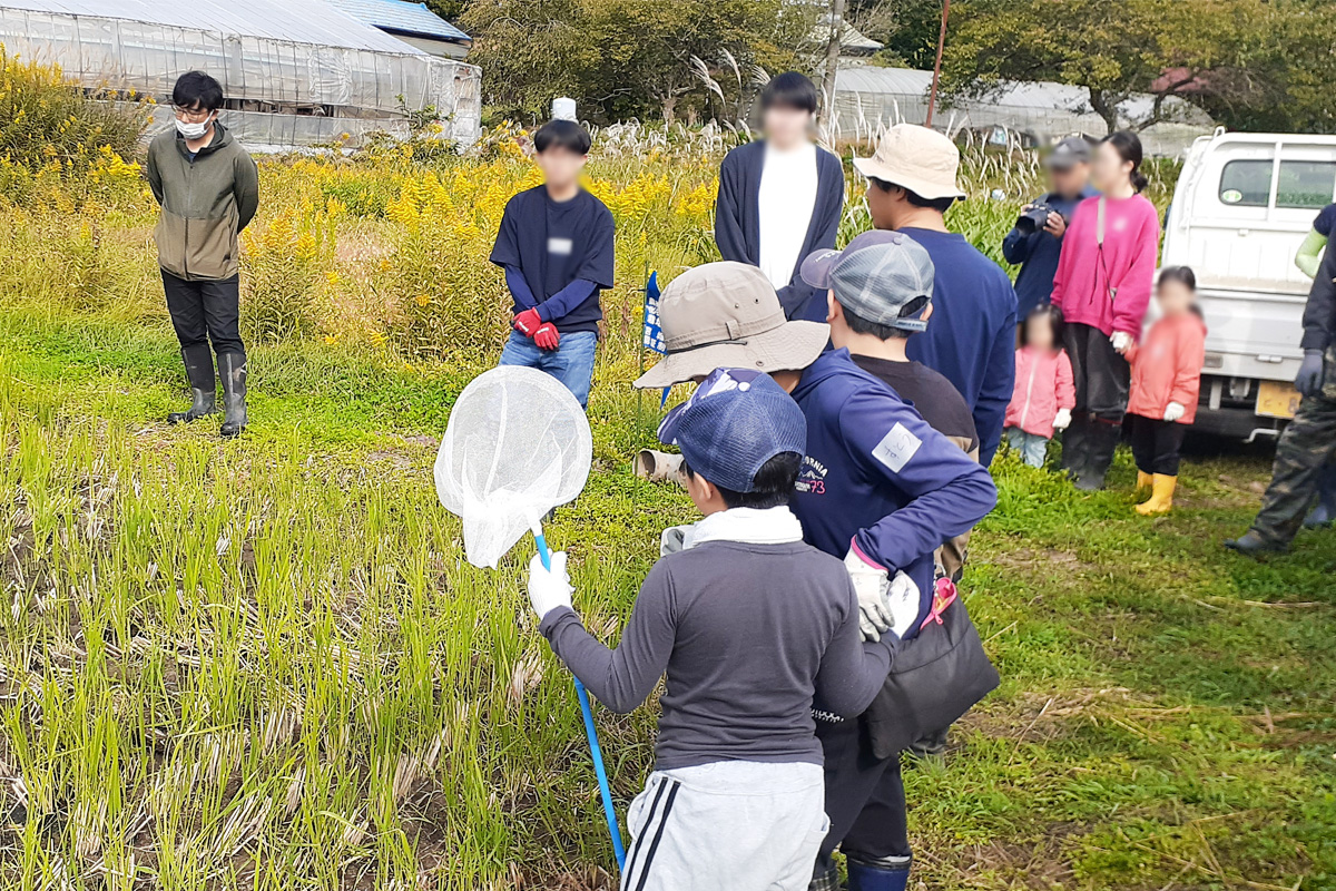 西塚さんの説明を聞く